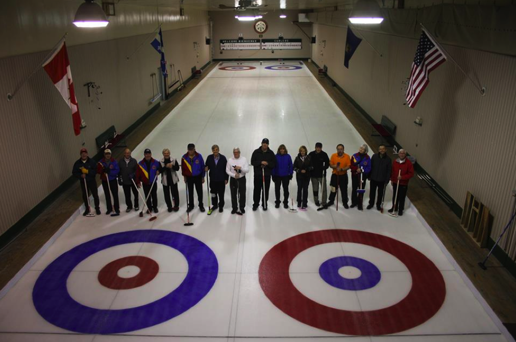 Players from the Tuesday night league at the Border Curling Club stop to take a group photo. All photos from this dispatch are by Tanya Mueller. 